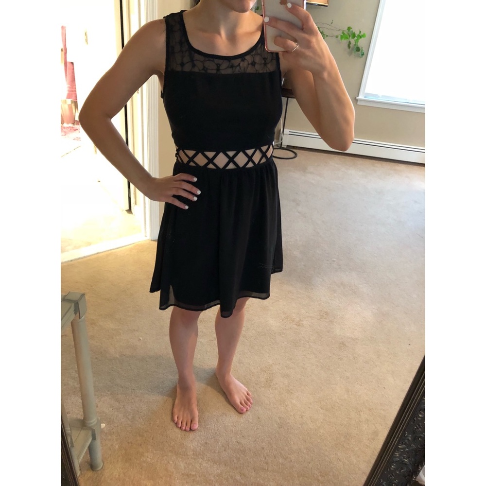 Black dress with cut outs and flower mesh top